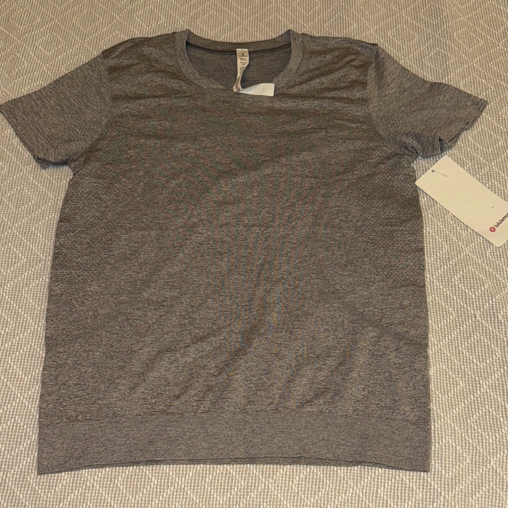 Women’s Swiftly Breathe Short Sleeve Heather Grey Crew Neck Short Sleeve Shirt
